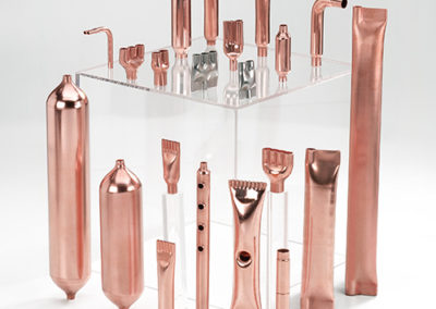 Widespread copper flutes arranged together constructed by Spinco Metal Products Inc in Newark, NY